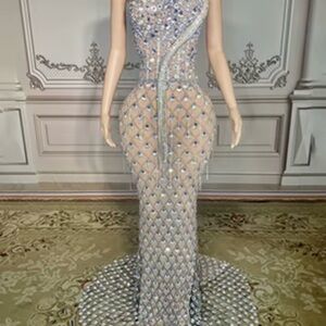 Elegant Evening Gown (beige lining) has clear “gems” size 10/12. Has stretch
